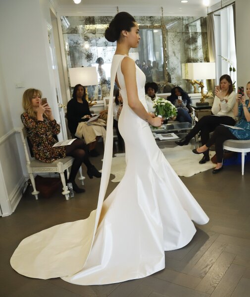 Bridal designers talk princess moments and Meghan Markle AP News